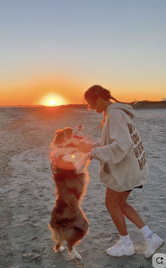 Girl and dog at beach